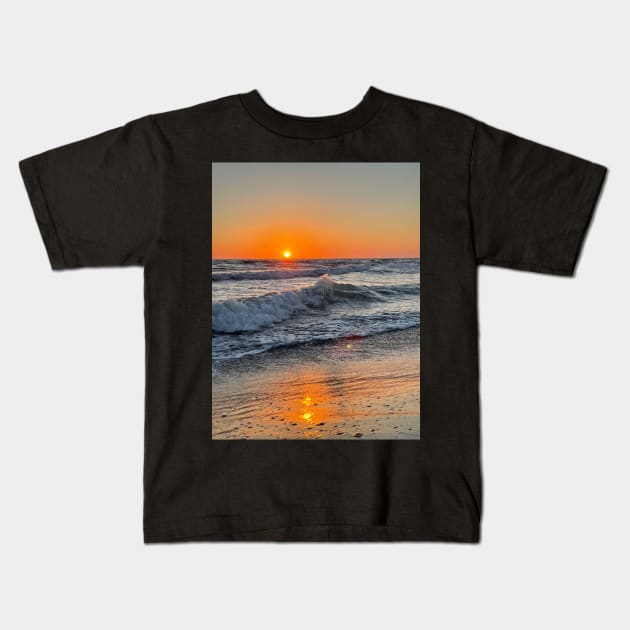 Photo of a sunset on the beach waves in the Mediterranean ocean of Tuscany Kids T-Shirt by Sgrel-art